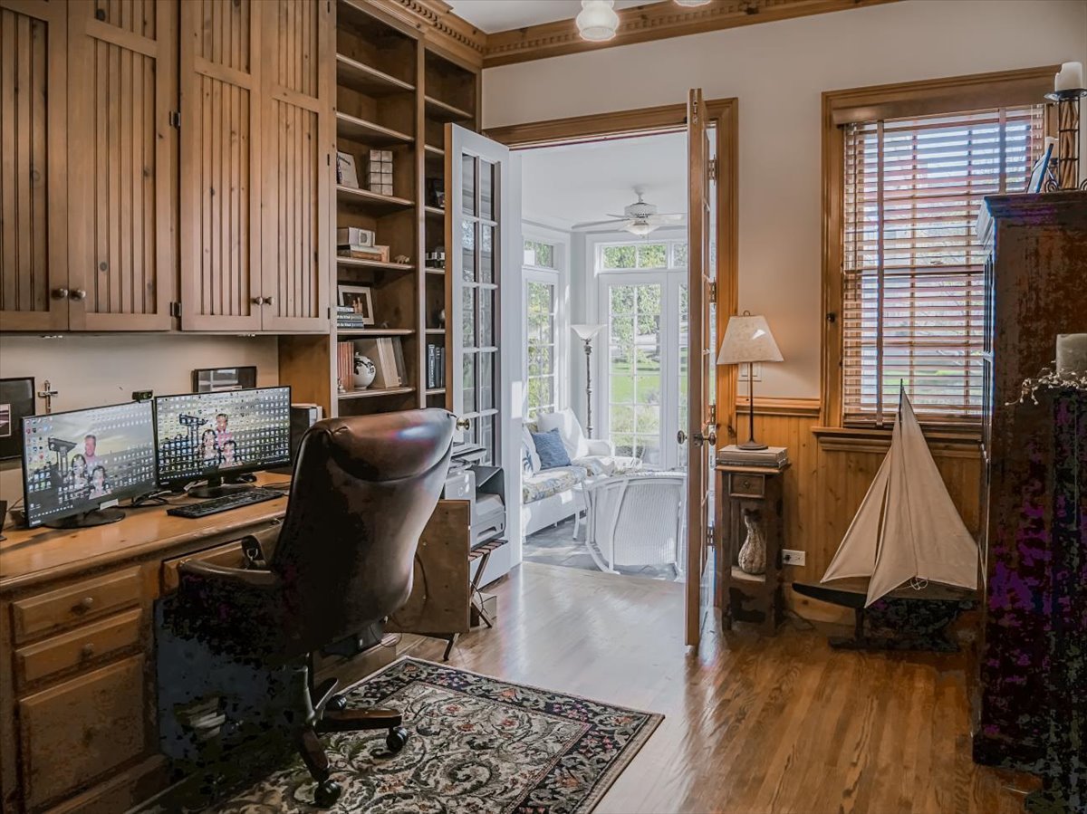 8010 Greenbriar Court Burr Ridge, IL 60527 - Photo 15 of 57 a view of a workspace with furniture and a window