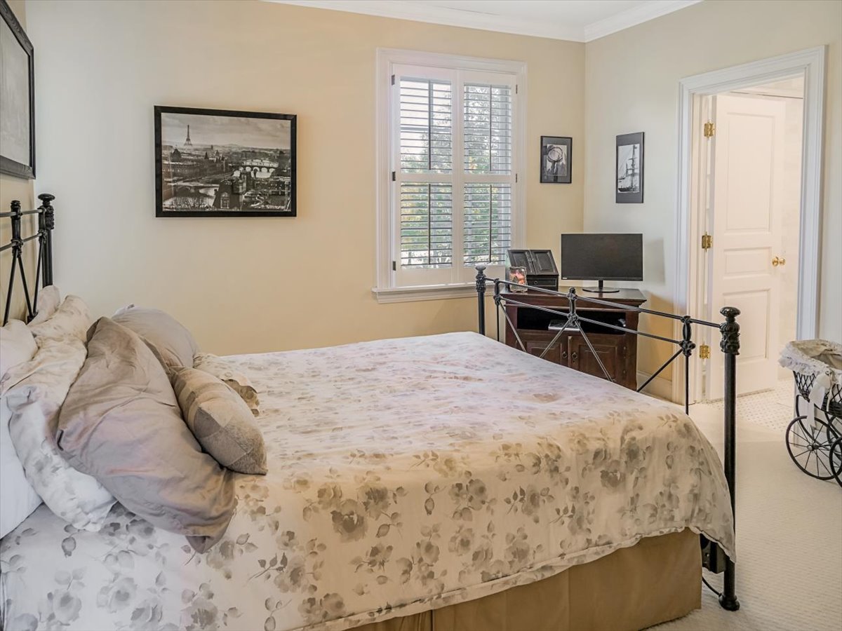 8010 Greenbriar Court Burr Ridge, IL 60527 - Photo 18 of 57 a bedroom with a bed and a desk