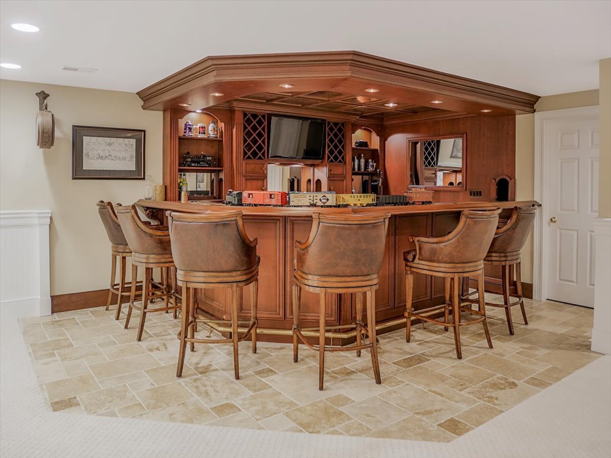8010 Greenbriar Court Burr Ridge, IL 60527 - Photo 39 of 57 a dining hall with stainless steel appliances kitchen island granite countertop a dining table and chairs