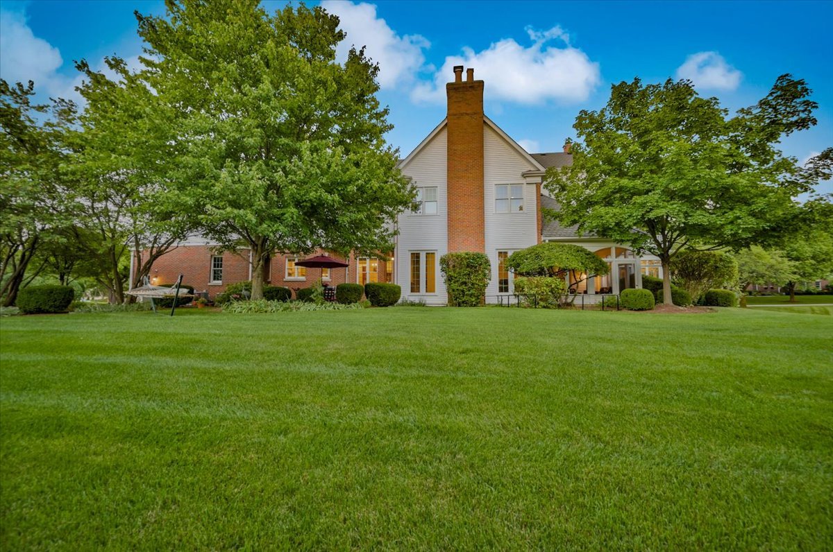 8010 Greenbriar Court Burr Ridge, IL 60527 - Photo 47 of 57 a front view of a house with garden