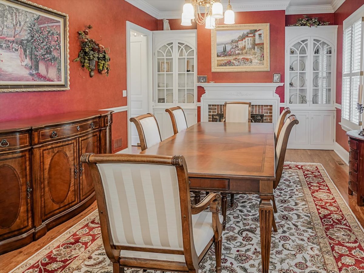 8010 Greenbriar Court Burr Ridge, IL 60527 - Photo 5 of 57 a view of a dining room with furniture window and wooden floor