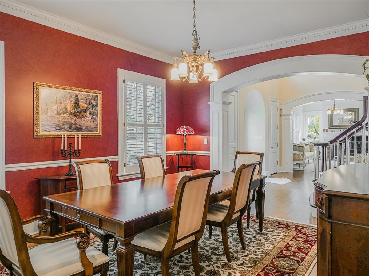 8010 Greenbriar Court Burr Ridge, IL 60527 - Photo 6 of 57 a view of a dining room with furniture and wooden floor