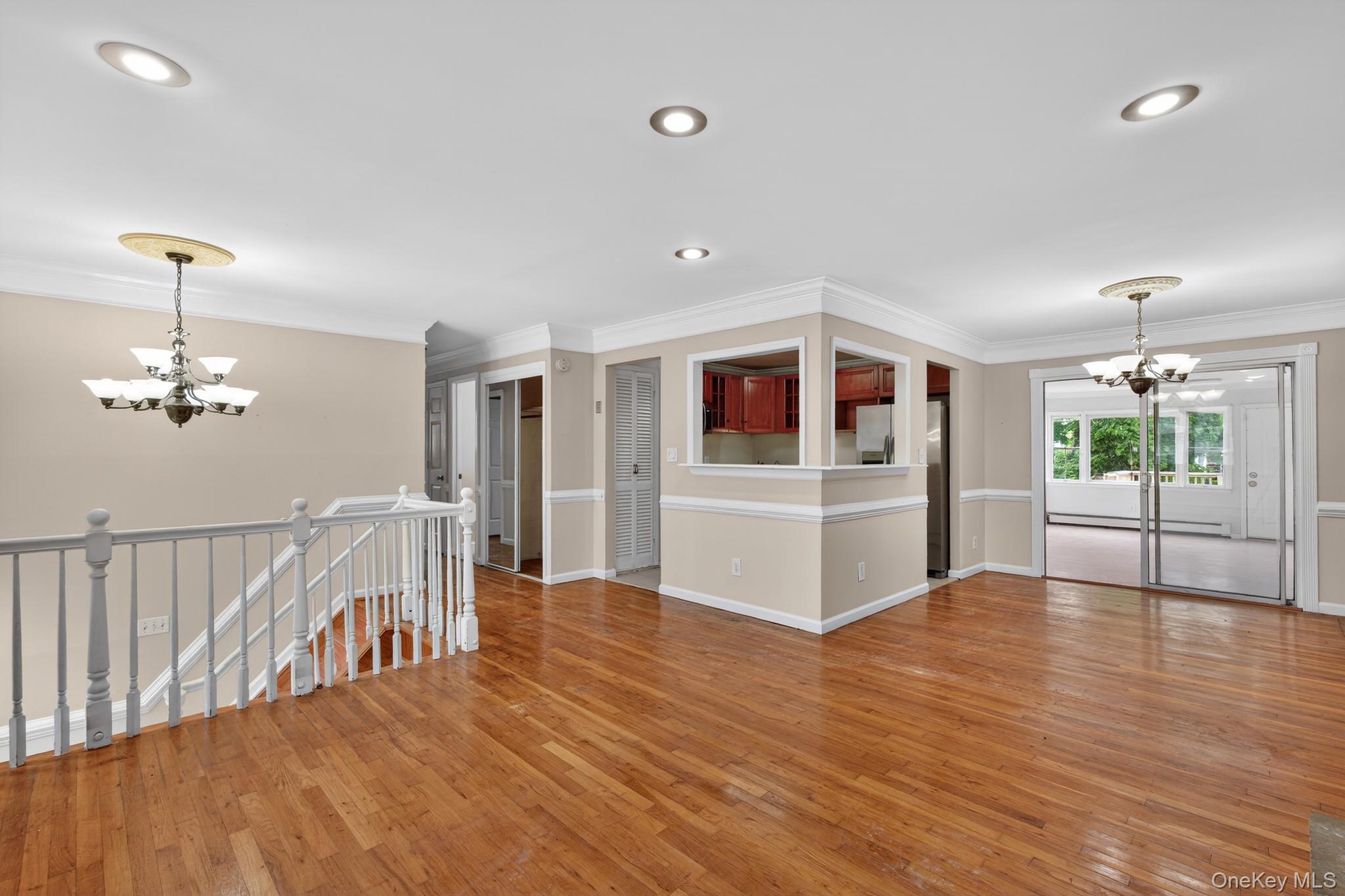 138 Spring Street Massapequa, NY 11758 - Photo 5 of 45 a view of a kitchen with a sink cabinets and wooden floor