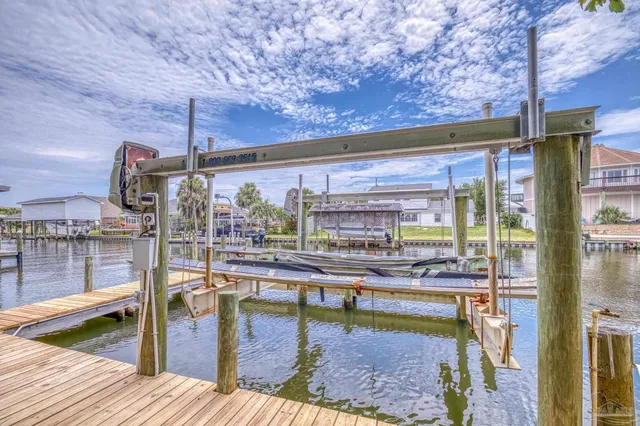 a view of swimming pool with outdoor seating