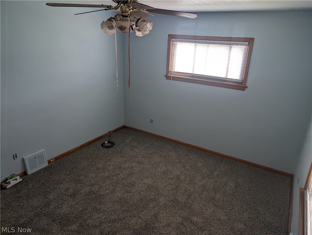 30213 Barjode Road Willowick, OH 44095 - Photo 14 of 20 Empty room featuring carpet flooring and ceiling fan