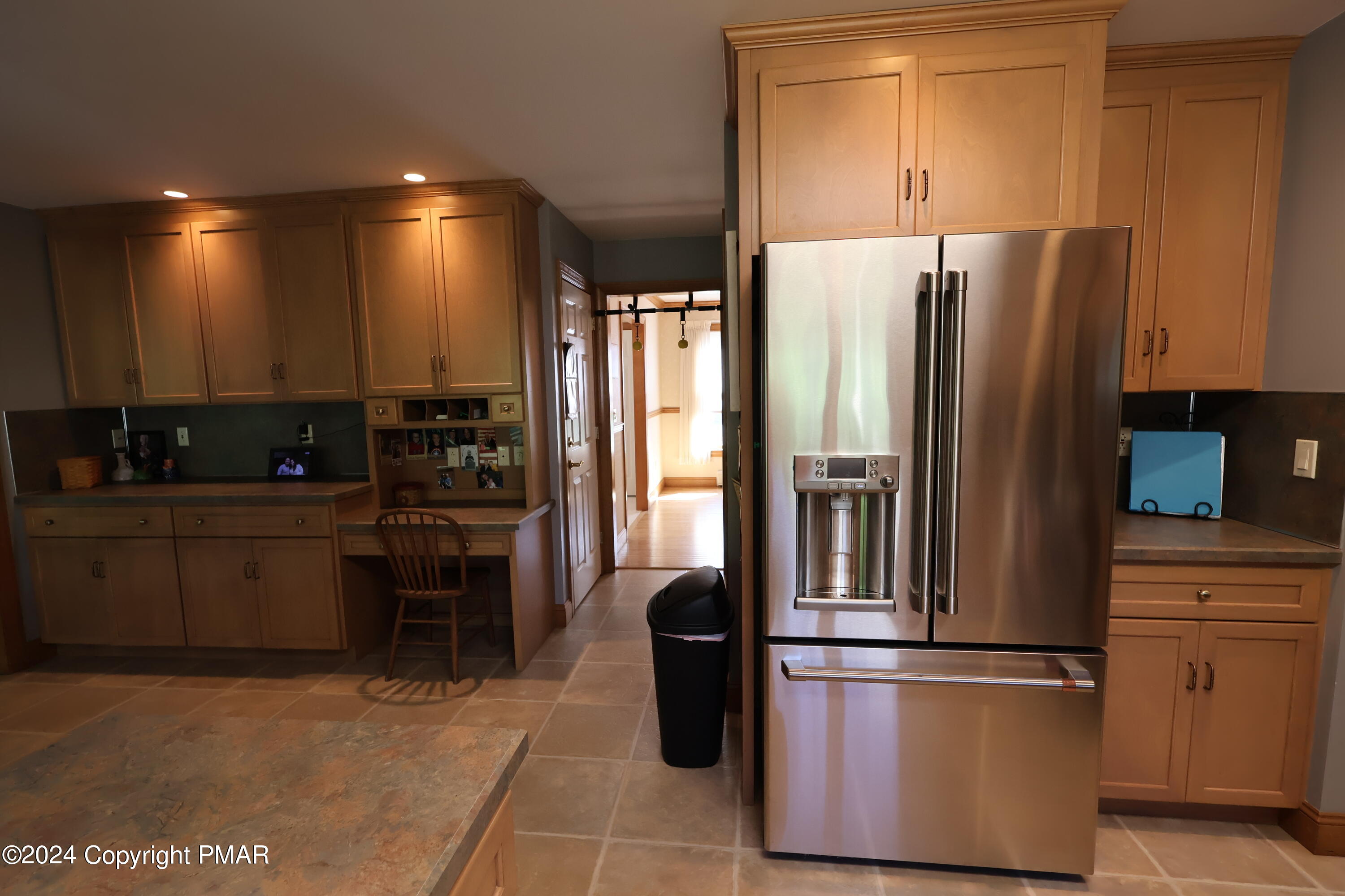 1179 Dotta Drive Pen Argyl, PA 18072 - Photo 12 of 39 a kitchen with stainless steel appliances granite countertop a refrigerator a stove a sink and a microwave