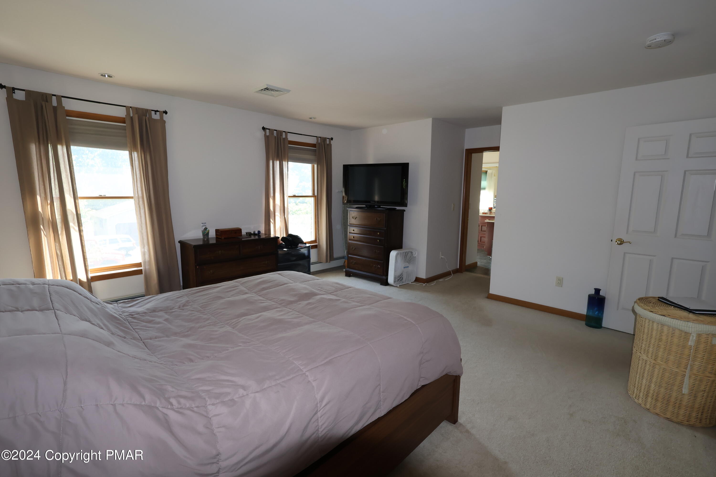 1179 Dotta Drive Pen Argyl, PA 18072 - Photo 23 of 39 a bedroom with a bed and a dresser