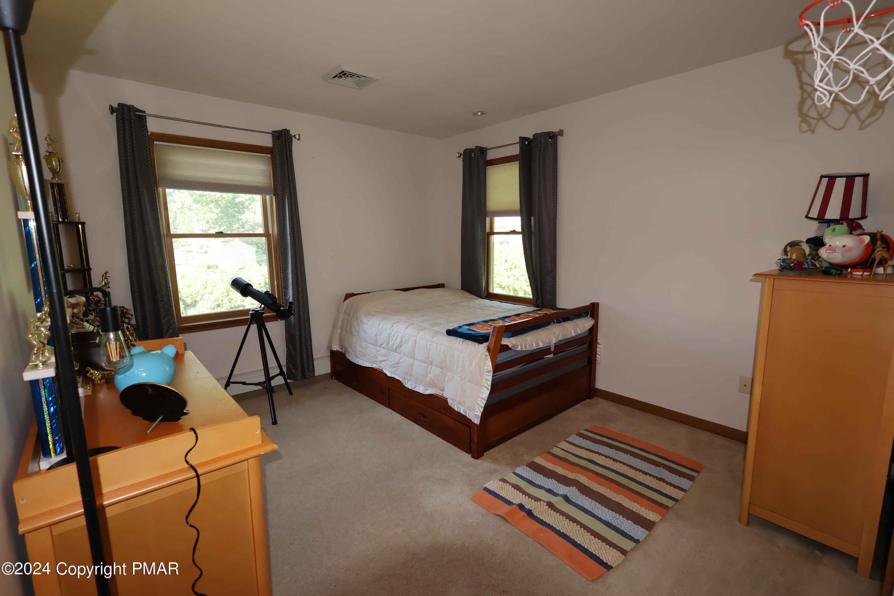 1179 Dotta Drive Pen Argyl, PA 18072 - Photo 26 of 39 a bedroom with furniture and a window