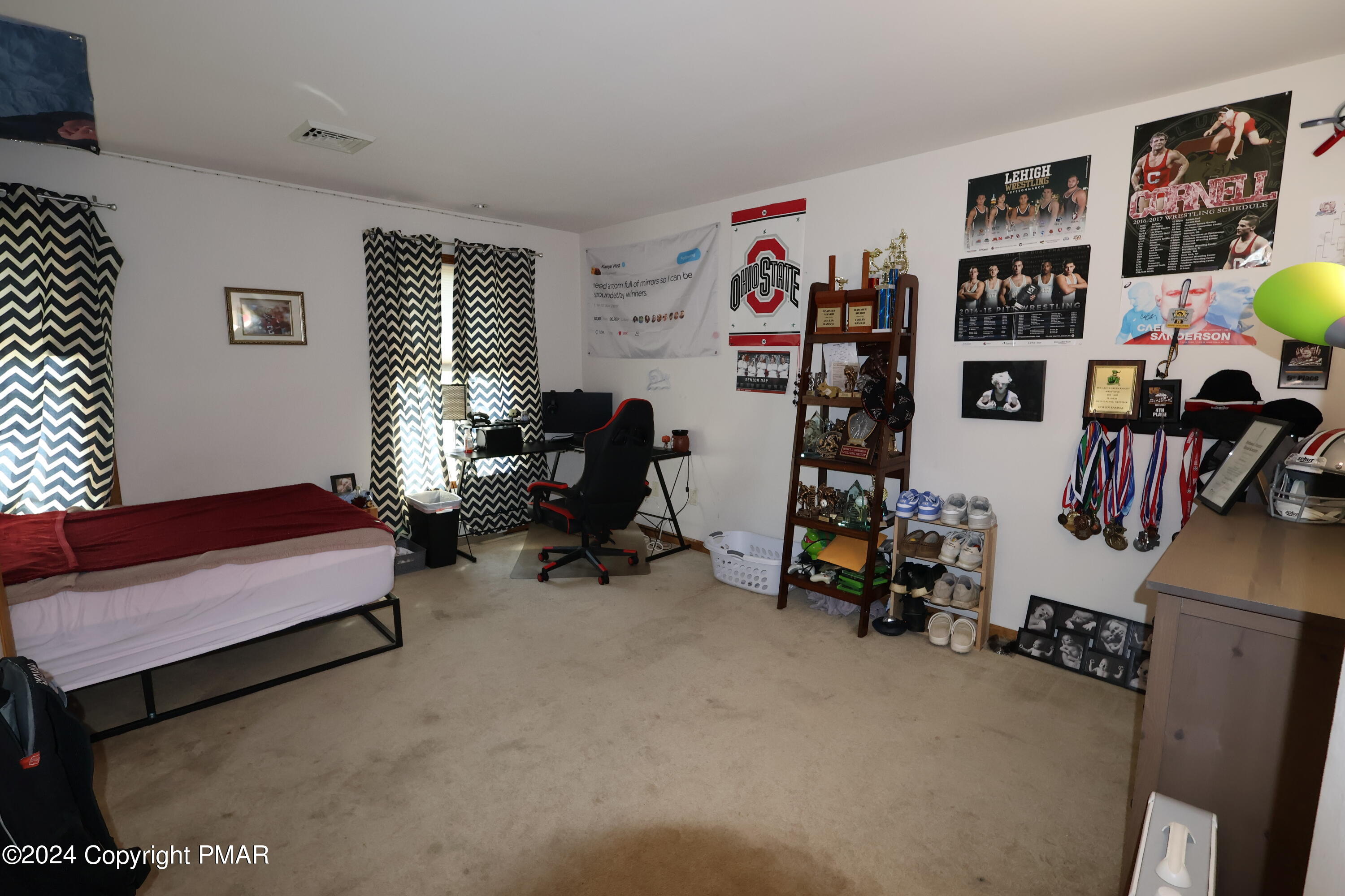 1179 Dotta Drive Pen Argyl, PA 18072 - Photo 30 of 39 a bedroom with furniture and a window
