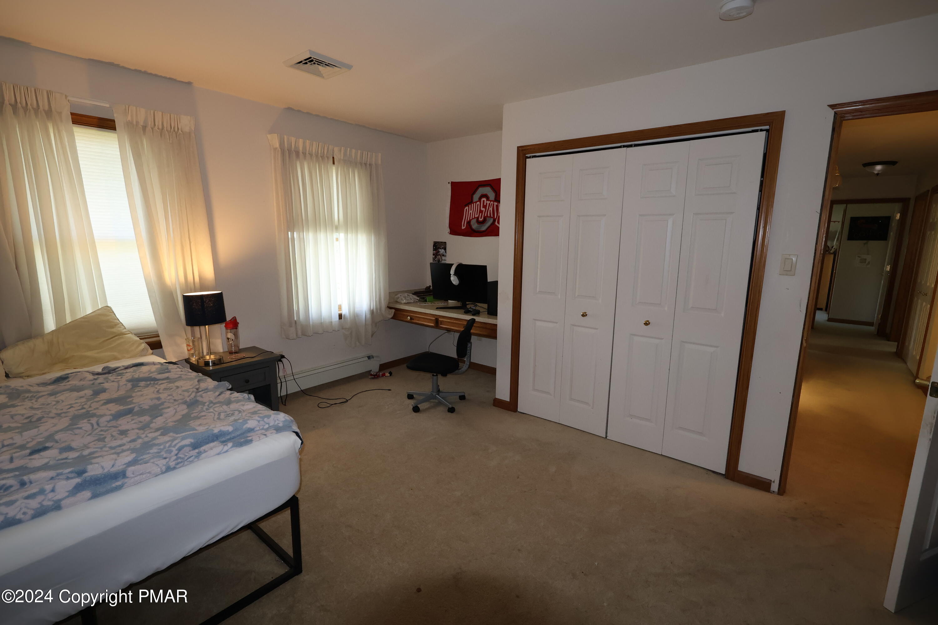 1179 Dotta Drive Pen Argyl, PA 18072 - Photo 33 of 39 a bedroom with a bed and a window