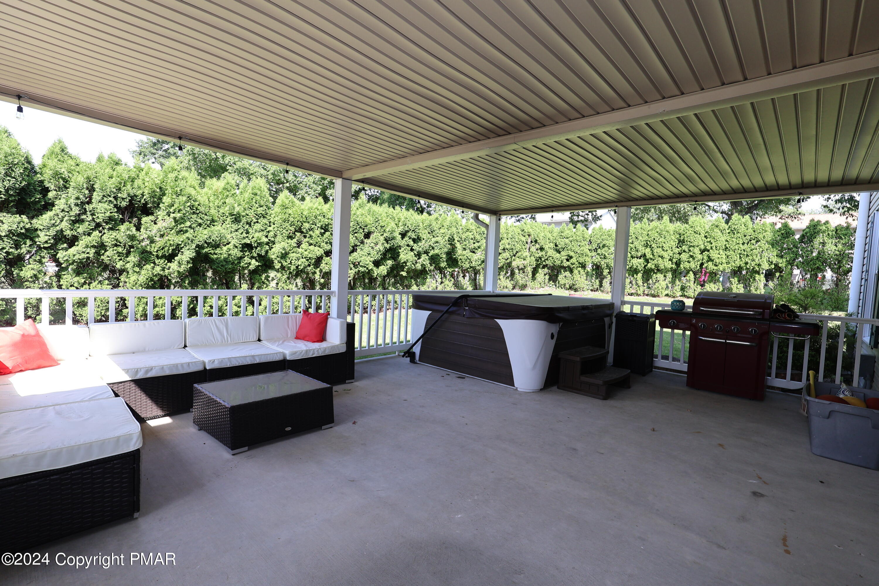 1179 Dotta Drive Pen Argyl, PA 18072 - Photo 7 of 39 a living room with a table and a chairs