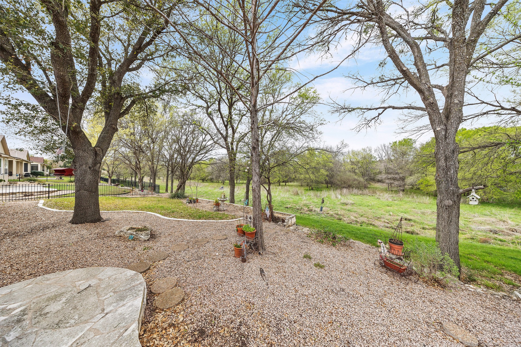 144 Stetson Trail Georgetown, TX 78633 - Photo 36 of 39 View of backyard from the stone patio