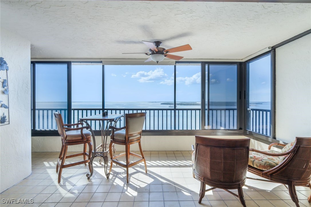 15021 Punta Rassa Road, Unit 902 Fort Myers, FL 33908 - Photo 1 of 31 a view of a chairs in balcony