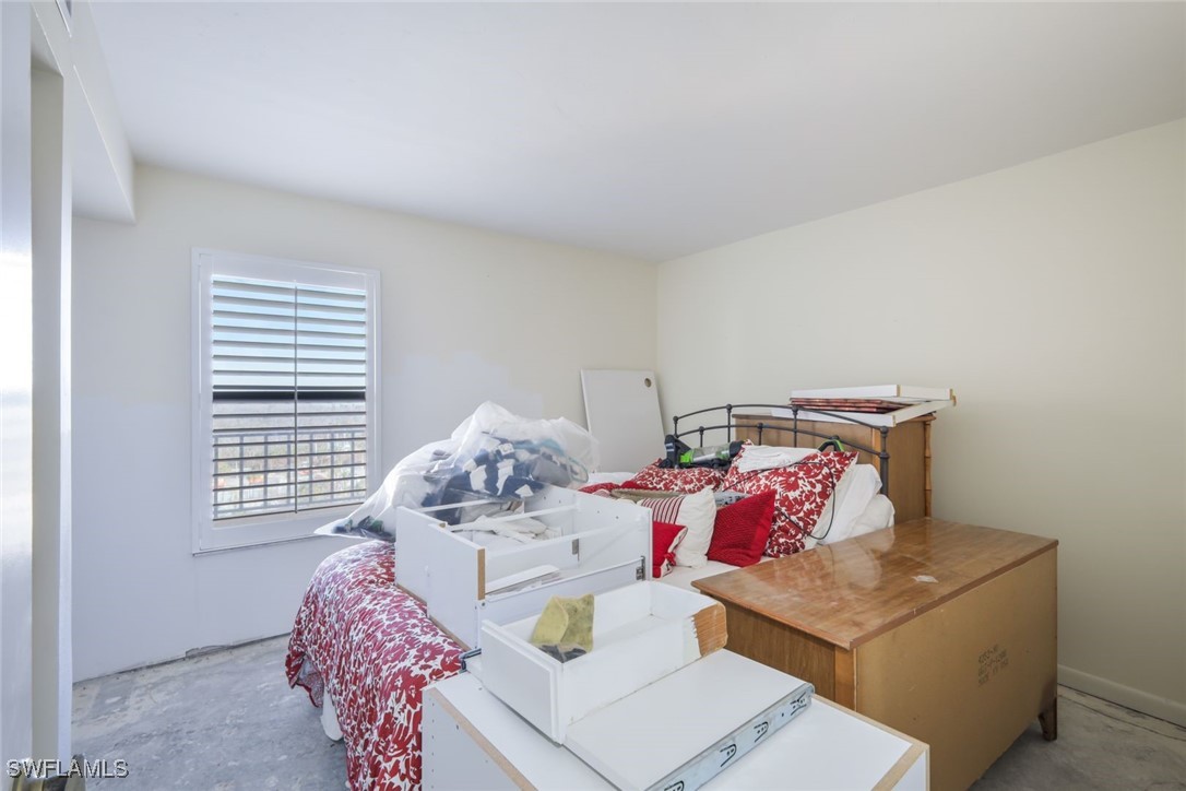 15021 Punta Rassa Road, Unit 902 Fort Myers, FL 33908 - Photo 16 of 31 a living room with furniture and a window