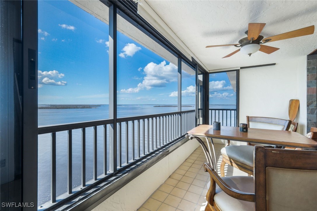 15021 Punta Rassa Road, Unit 902 Fort Myers, FL 33908 - Photo 20 of 31 a view of a balcony with furniture