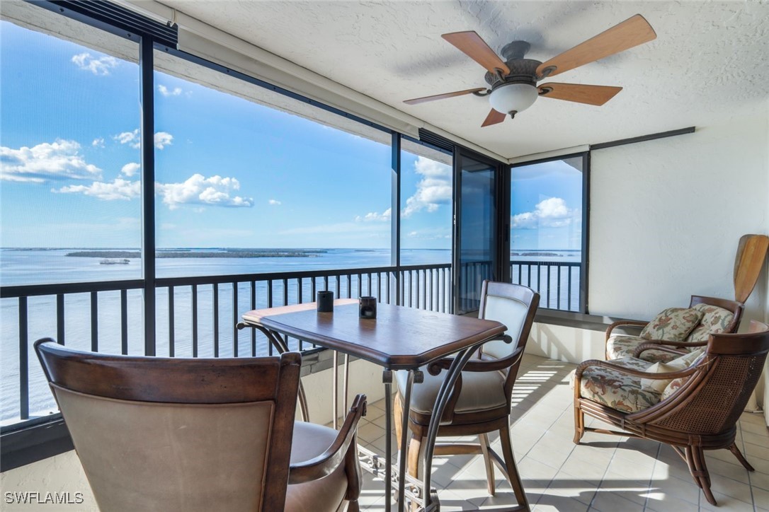 15021 Punta Rassa Road, Unit 902 Fort Myers, FL 33908 - Photo 22 of 31 a view of a dining room with furniture window and outside view