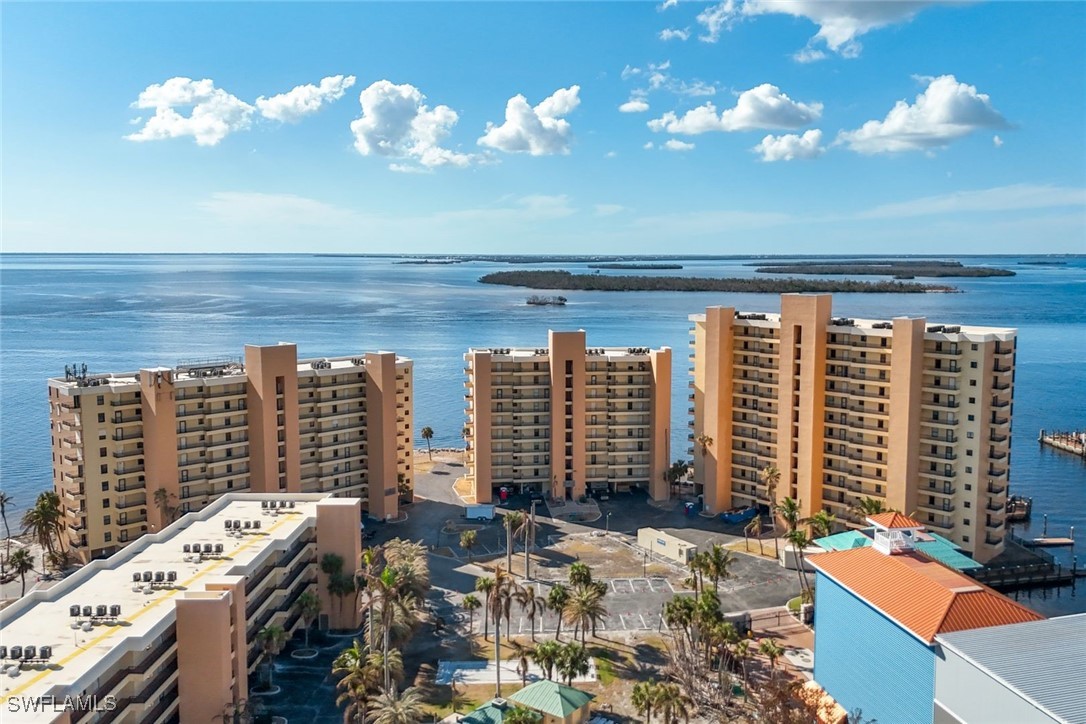 15021 Punta Rassa Road, Unit 902 Fort Myers, FL 33908 - Photo 25 of 31 a view of a balcony with chairs
