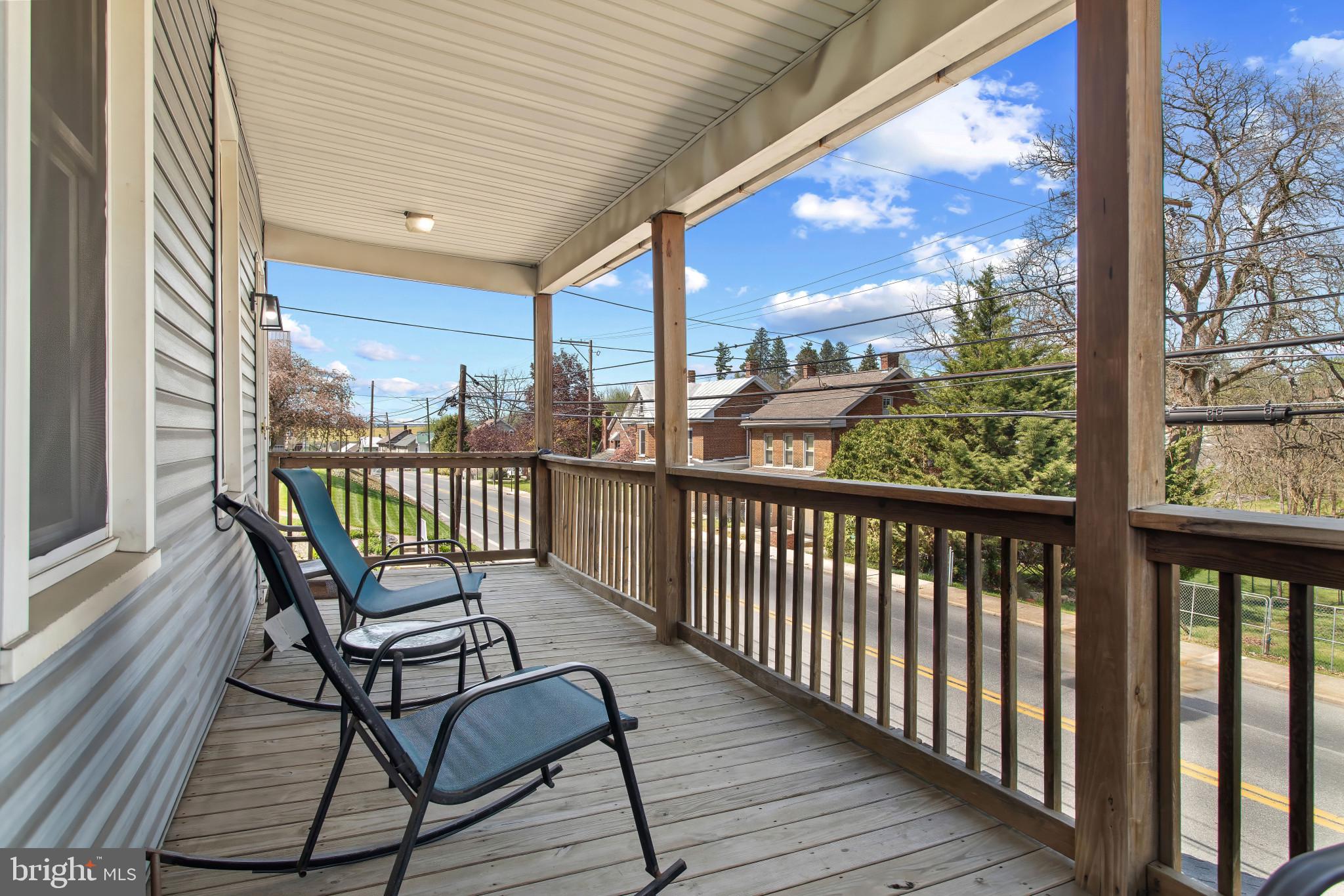 702 West Main Street Waynesboro, PA 17268 - Photo 4 of 32 a view of a city from a balcony with furniture