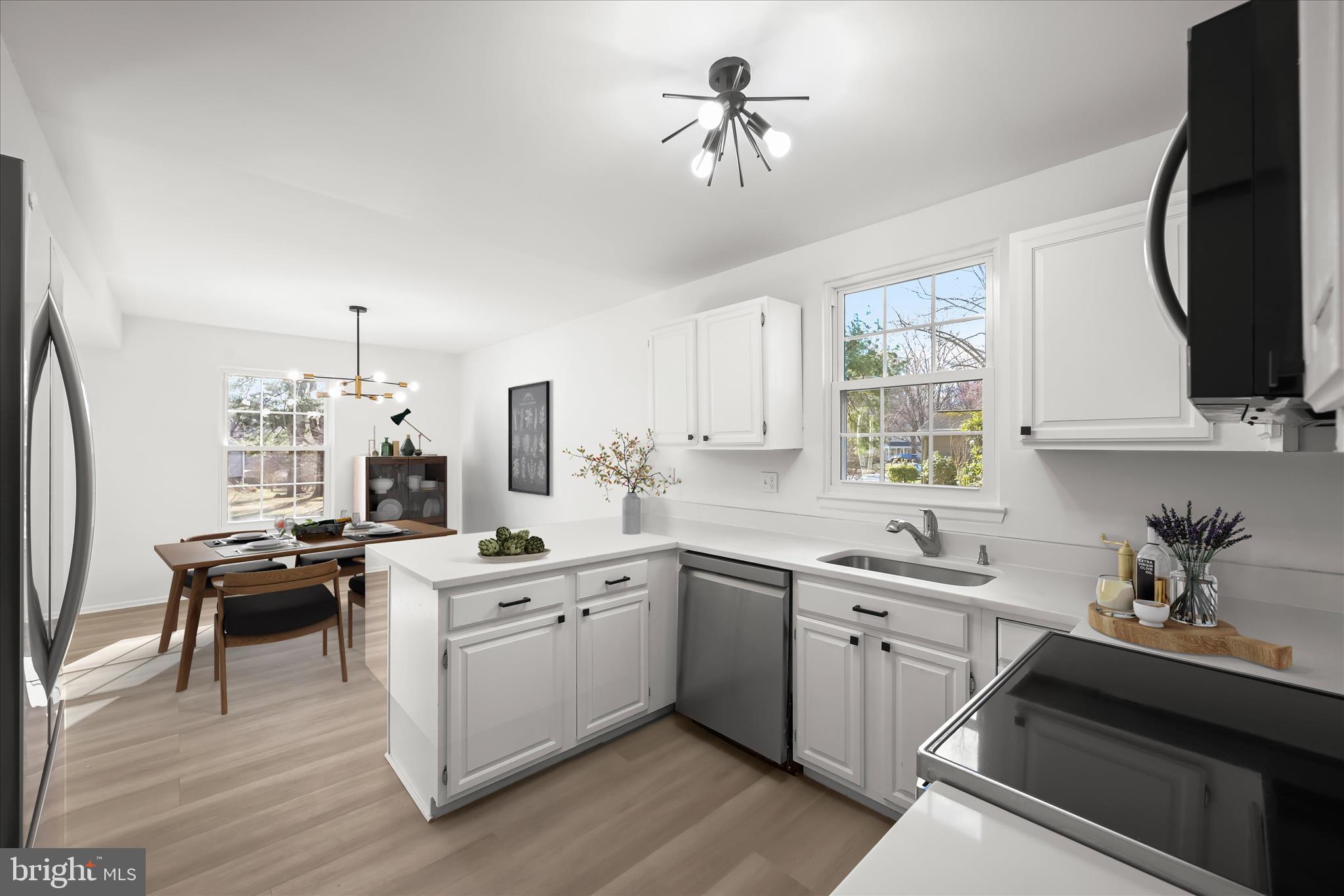 9344 Spring Water Path Jessup, MD 20794 - Photo 2 of 61 Renovated kitchen & breakfast room (virtual stage)