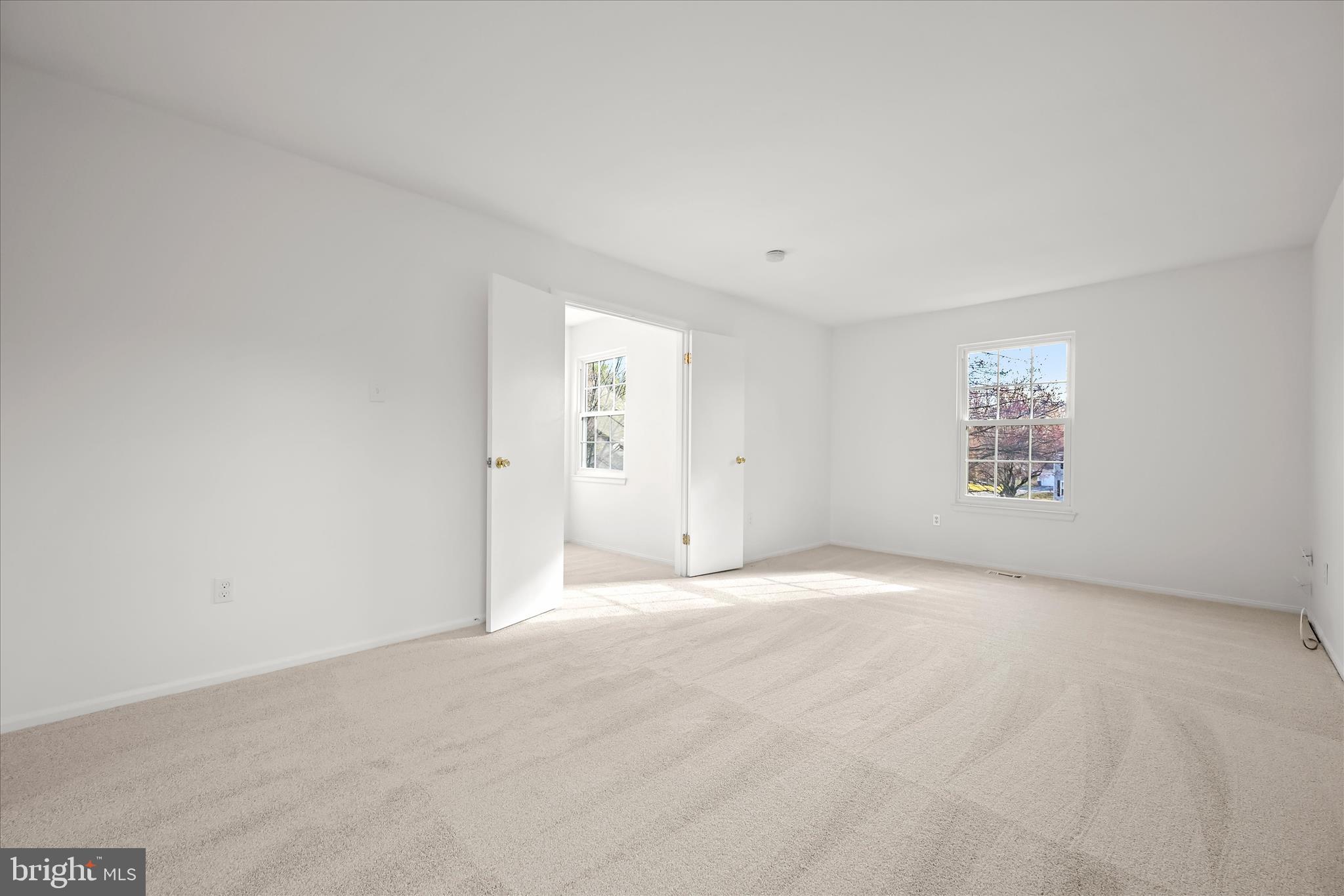 9344 Spring Water Path Jessup, MD 20794 - Photo 31 of 61 an empty room with a empty space and windows