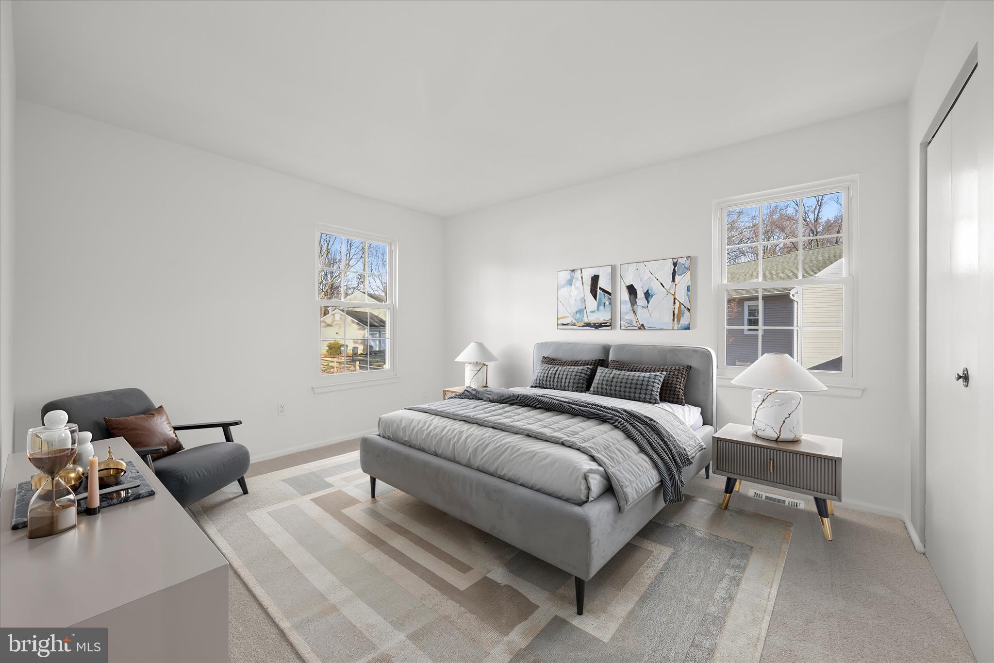 9344 Spring Water Path Jessup, MD 20794 - Photo 36 of 61 a bed room with a bed and a chair