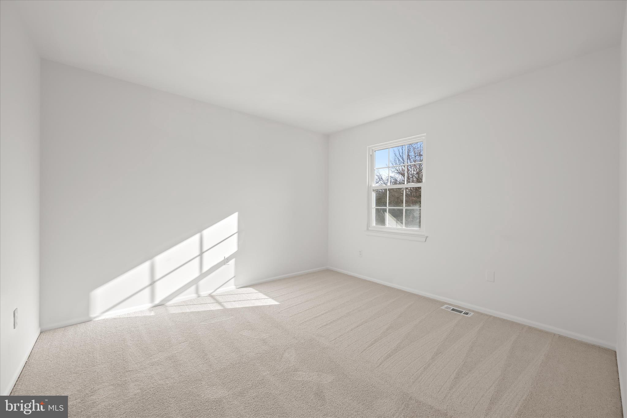 9344 Spring Water Path Jessup, MD 20794 - Photo 40 of 61 a view of an empty room with a window