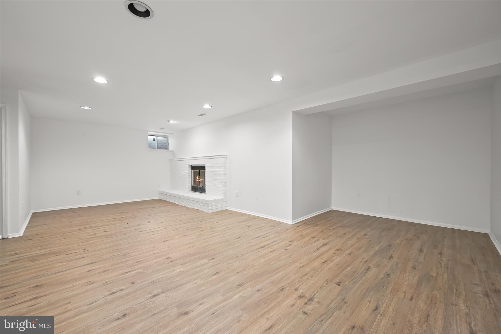 9344 Spring Water Path Jessup, MD 20794 - Photo 45 of 61 Family room w/ fireplace