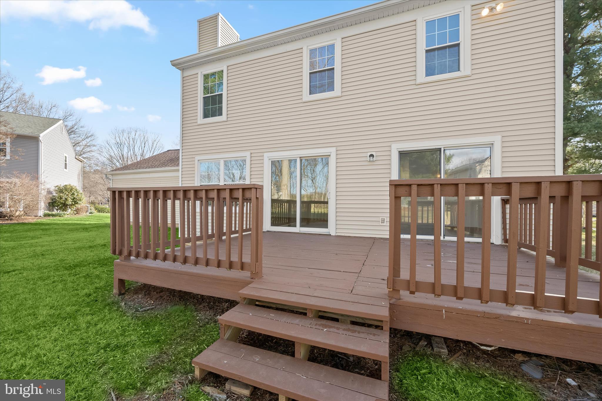 9344 Spring Water Path Jessup, MD 20794 - Photo 54 of 61 a view of a wooden bench sitting in the backyard