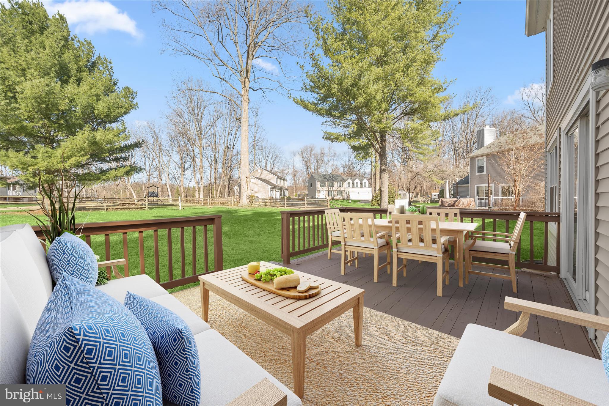 9344 Spring Water Path Jessup, MD 20794 - Photo 6 of 61 a view of a patio with couches table and chairs