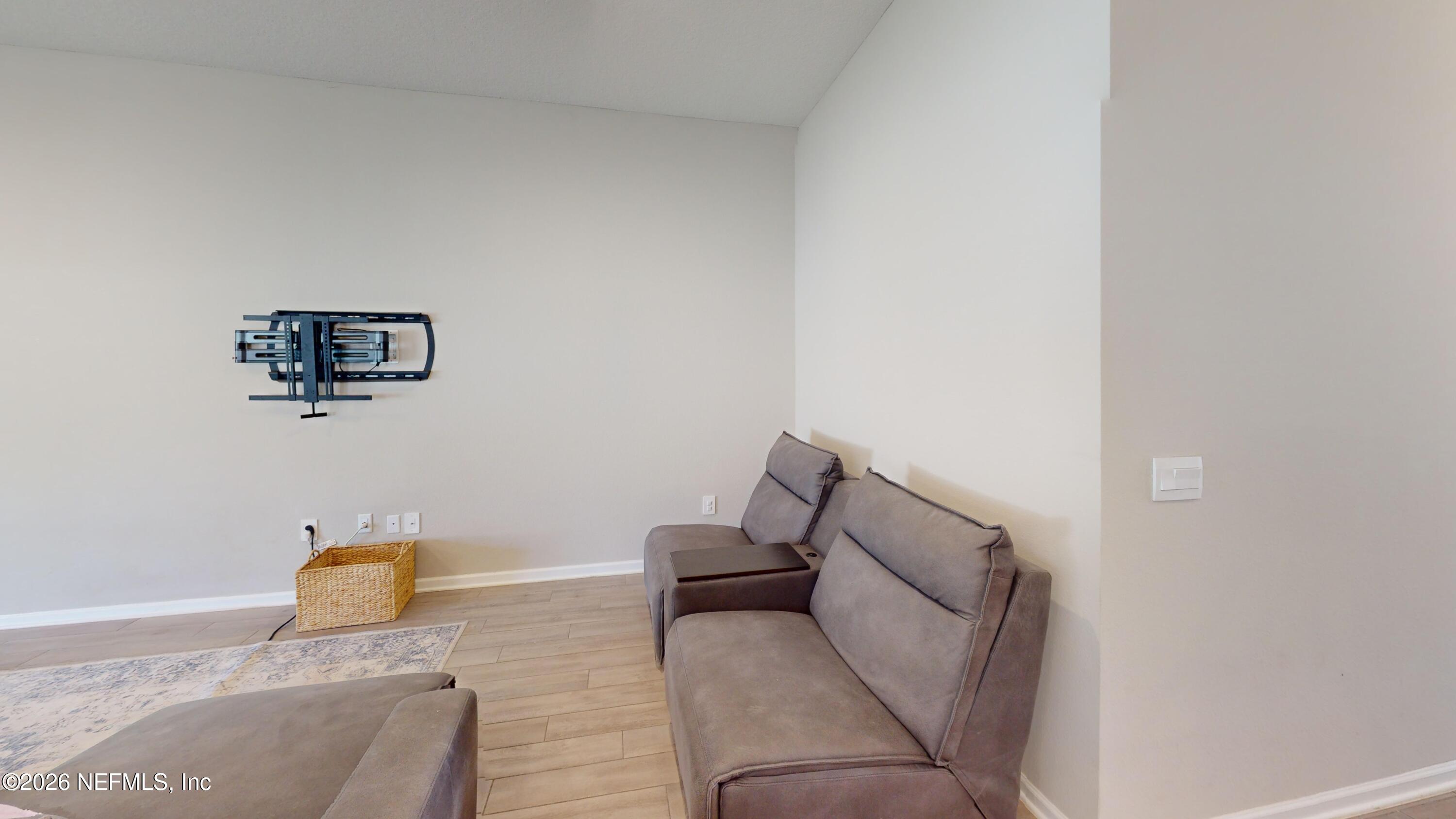 70625 Turtle Creek Yulee, FL 32097 - Photo 6 of 19 a living room with furniture and a couch