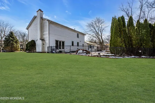 a view of a house with a big yard