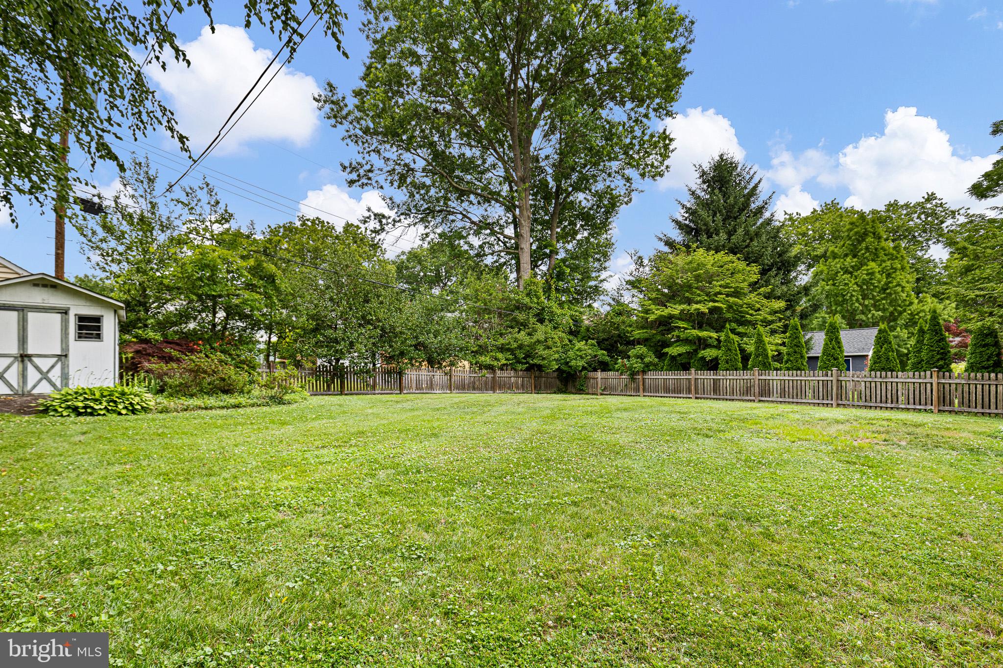 52 Sunset Road Newark, DE 19711 - Photo 24 of 25 a view of a field of grass and trees