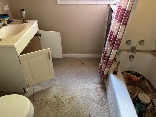 a room with furniture and a window