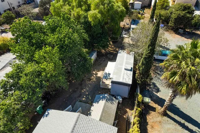 a view of a yard with an outdoor seating