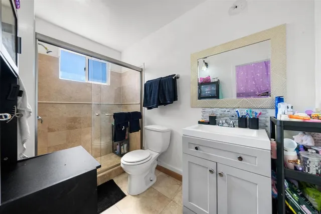 a room with a storage and utility room