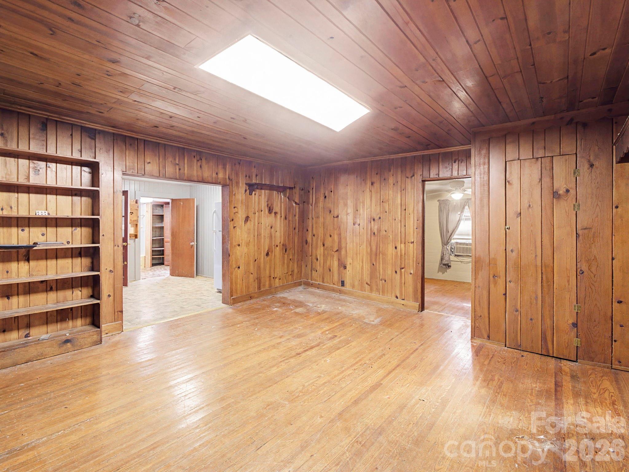 1526 Bills Creek Road Lake Lure, NC 28746 - Photo 11 of 25 a view of an empty room with a window