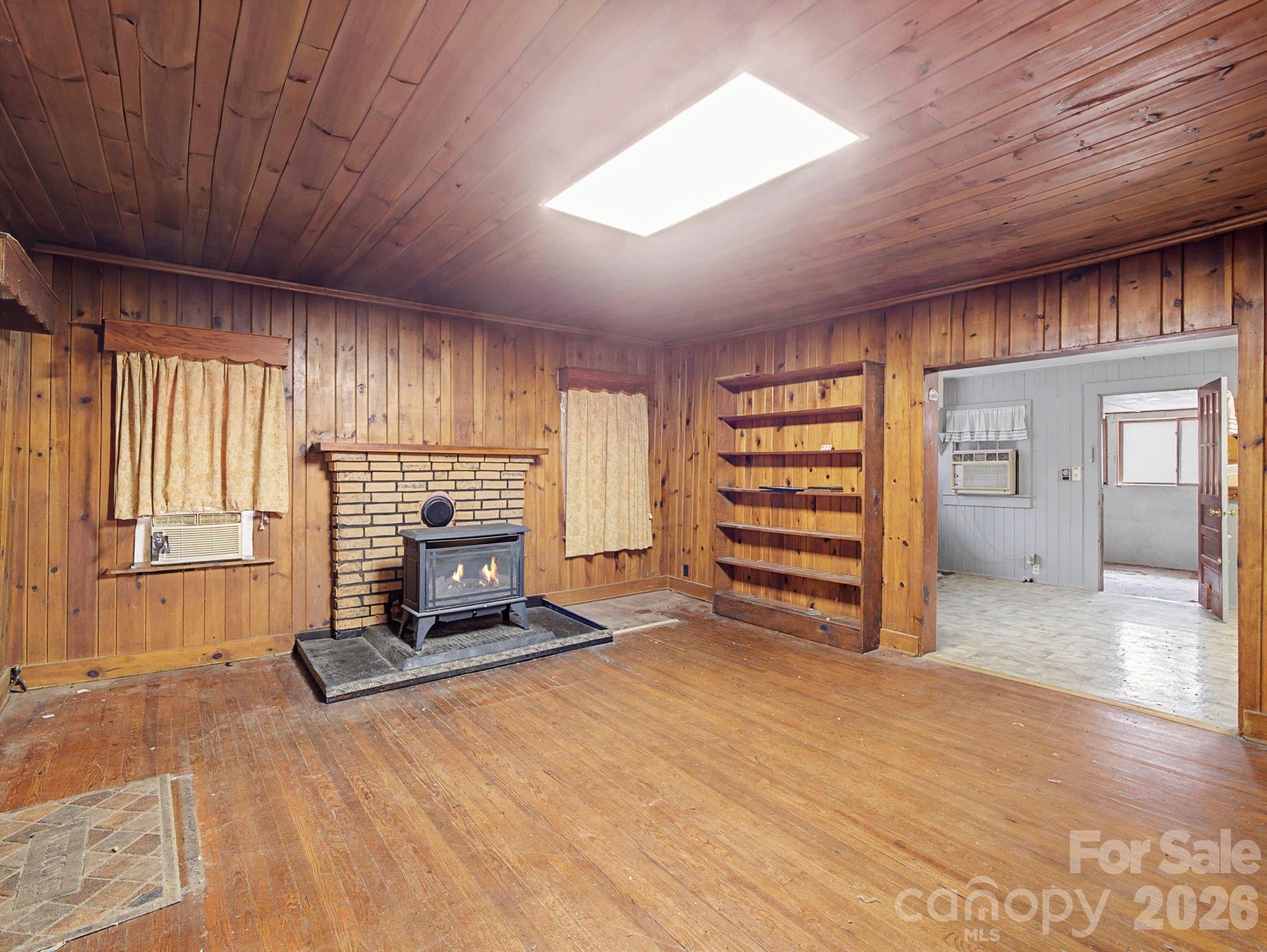 1526 Bills Creek Road Lake Lure, NC 28746 - Photo 12 of 25 a view of a room with a flat screen tv