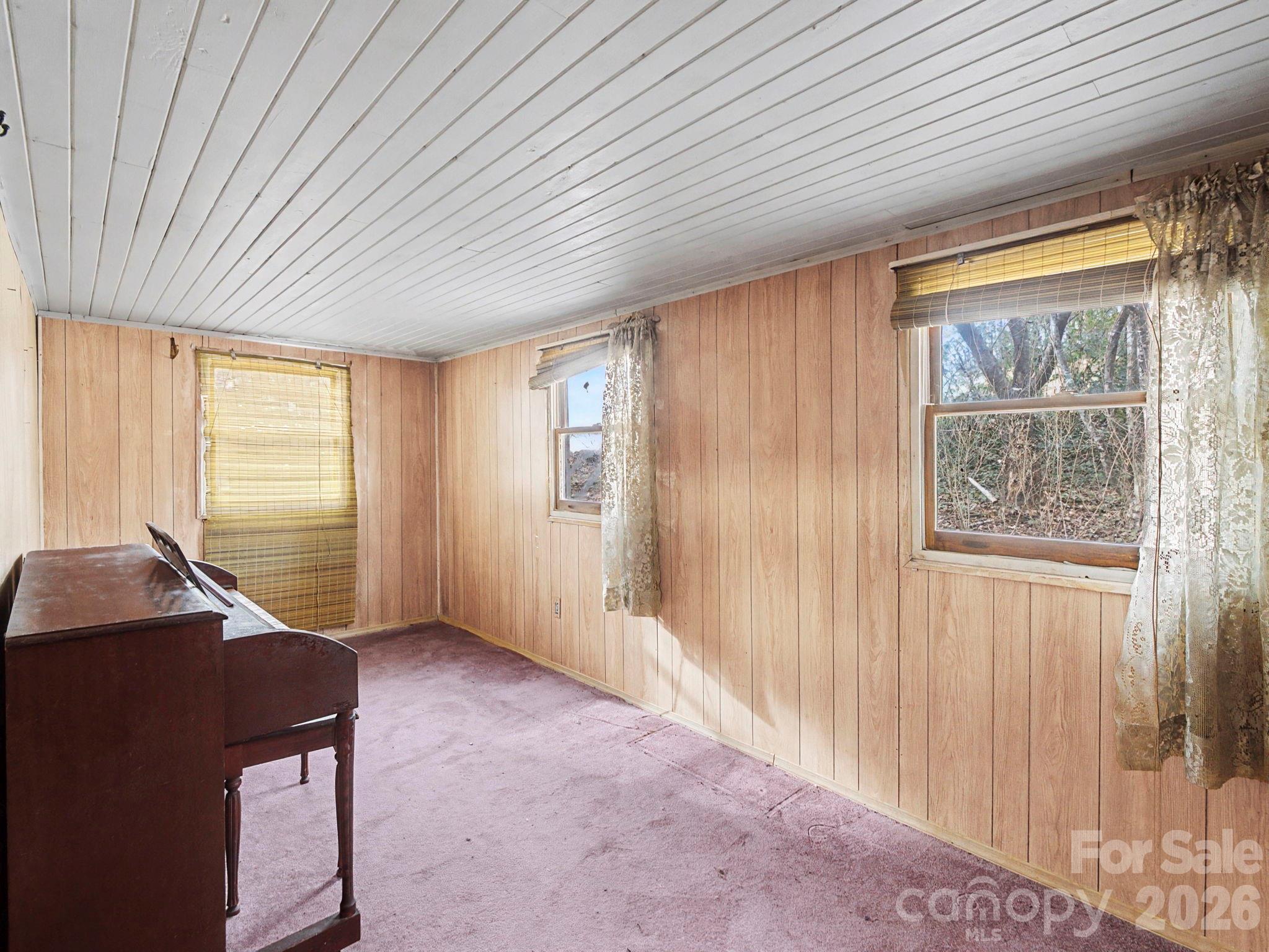 1526 Bills Creek Road Lake Lure, NC 28746 - Photo 14 of 25 a view of an empty room with a window