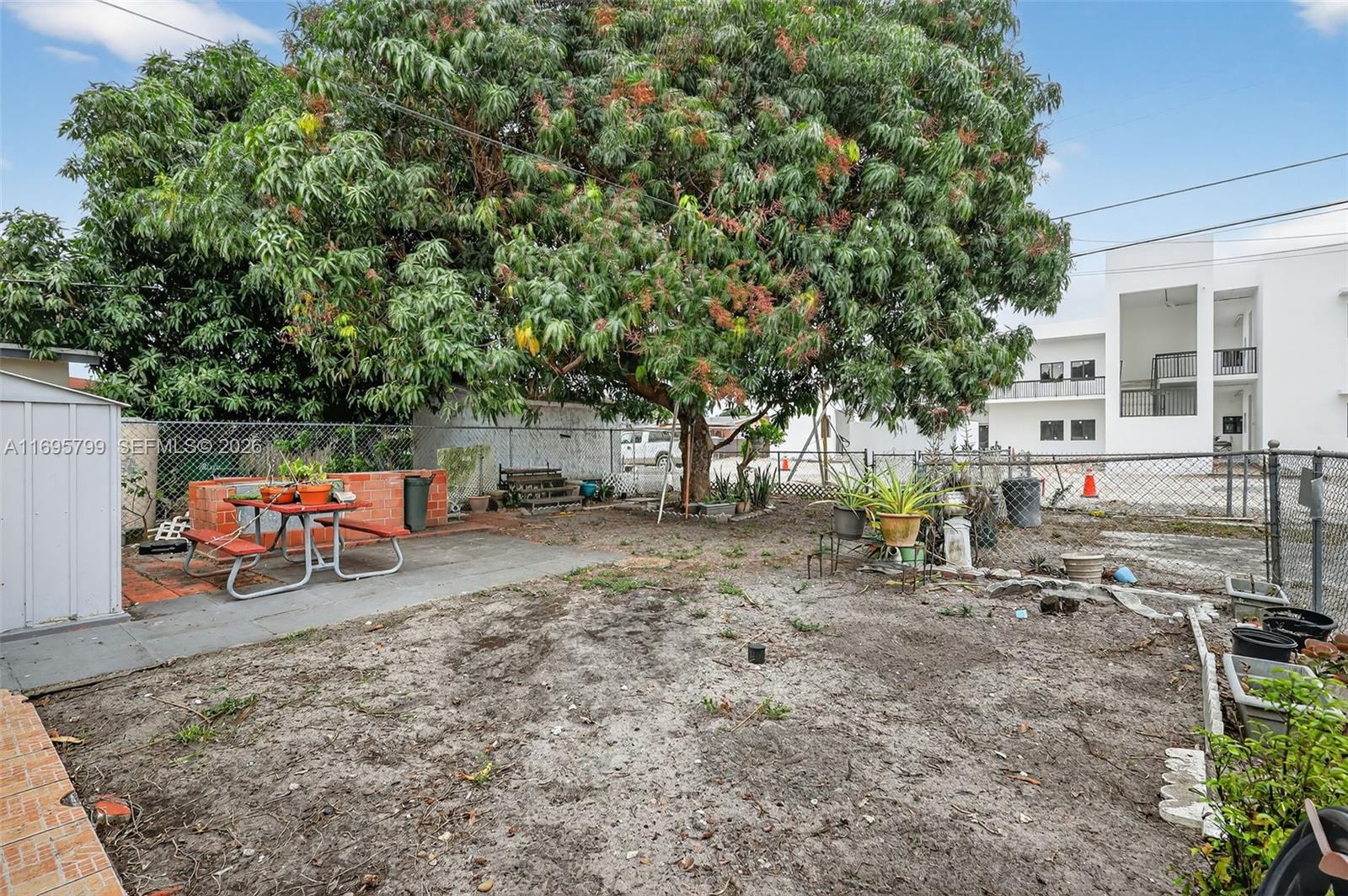 500 East 30th Street Hialeah, FL 33013 - Photo 12 of 41 a view of a yard with furniture and a bike