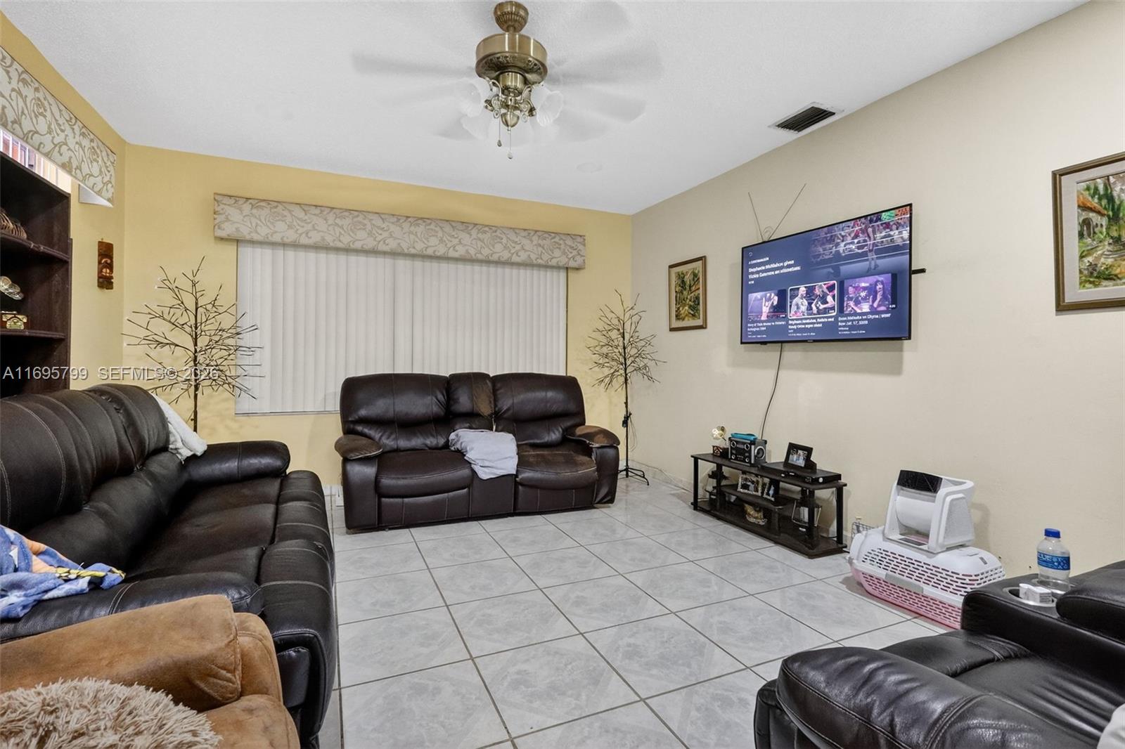 500 East 30th Street Hialeah, FL 33013 - Photo 28 of 41 a living room with furniture and a couch