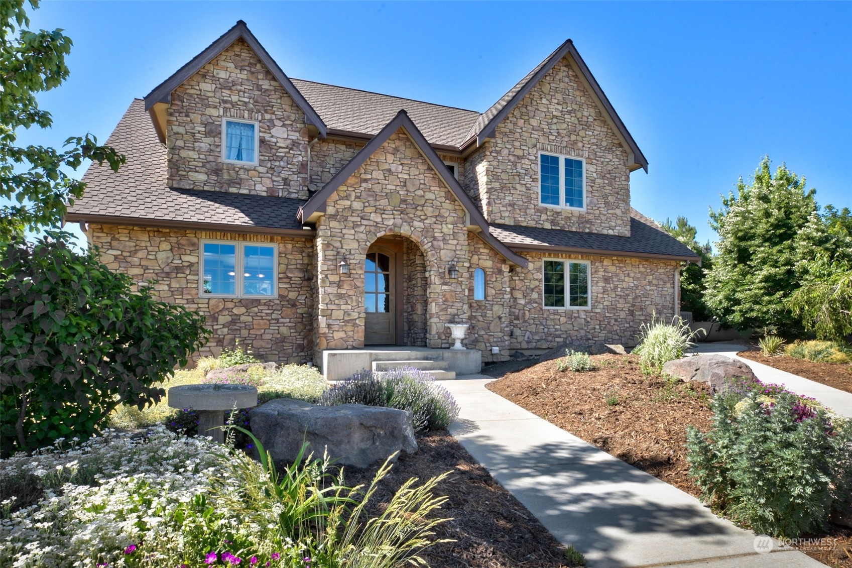 12302 Marble Road Yakima, WA 98908 - Photo 1 of 40 a front view of house with yard and trees around