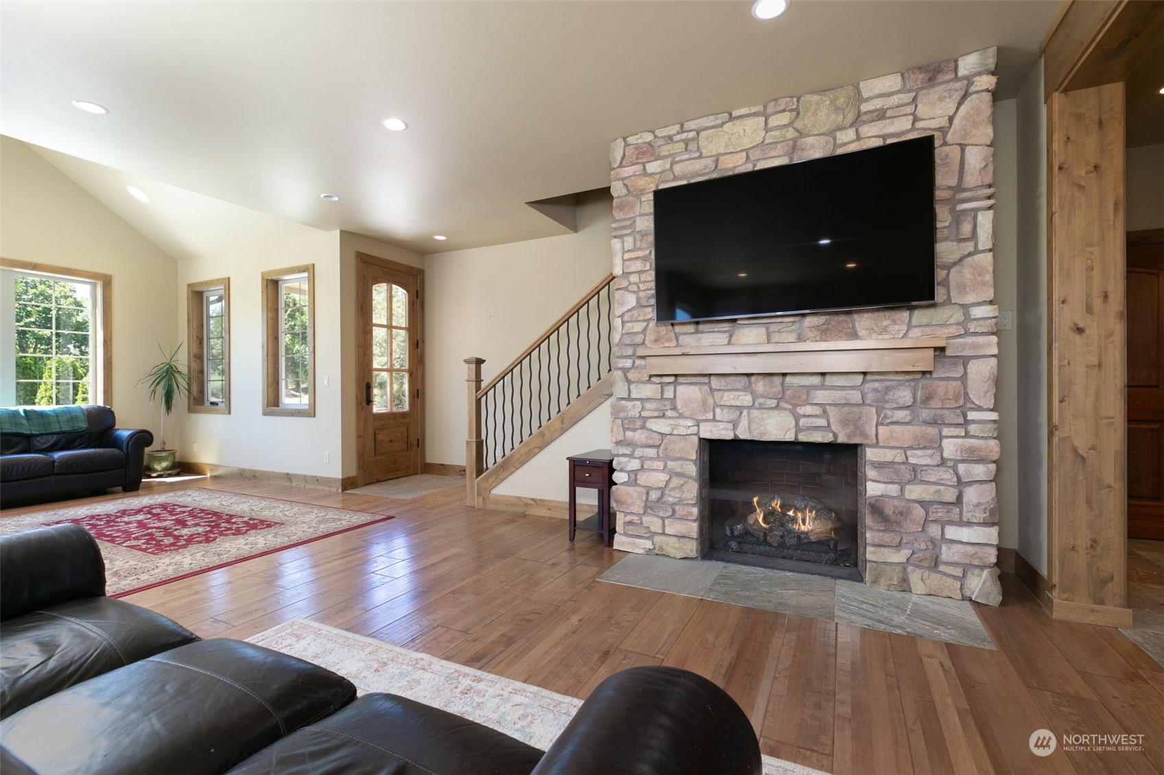 12302 Marble Road Yakima, WA 98908 - Photo 16 of 40 a living room with furniture and a fireplace or television