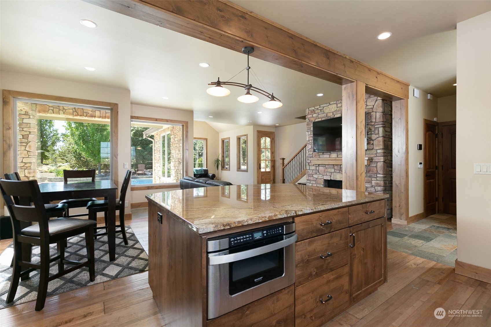 12302 Marble Road Yakima, WA 98908 - Photo 23 of 40 a kitchen with stainless steel appliances granite countertop a stove and a wooden floors