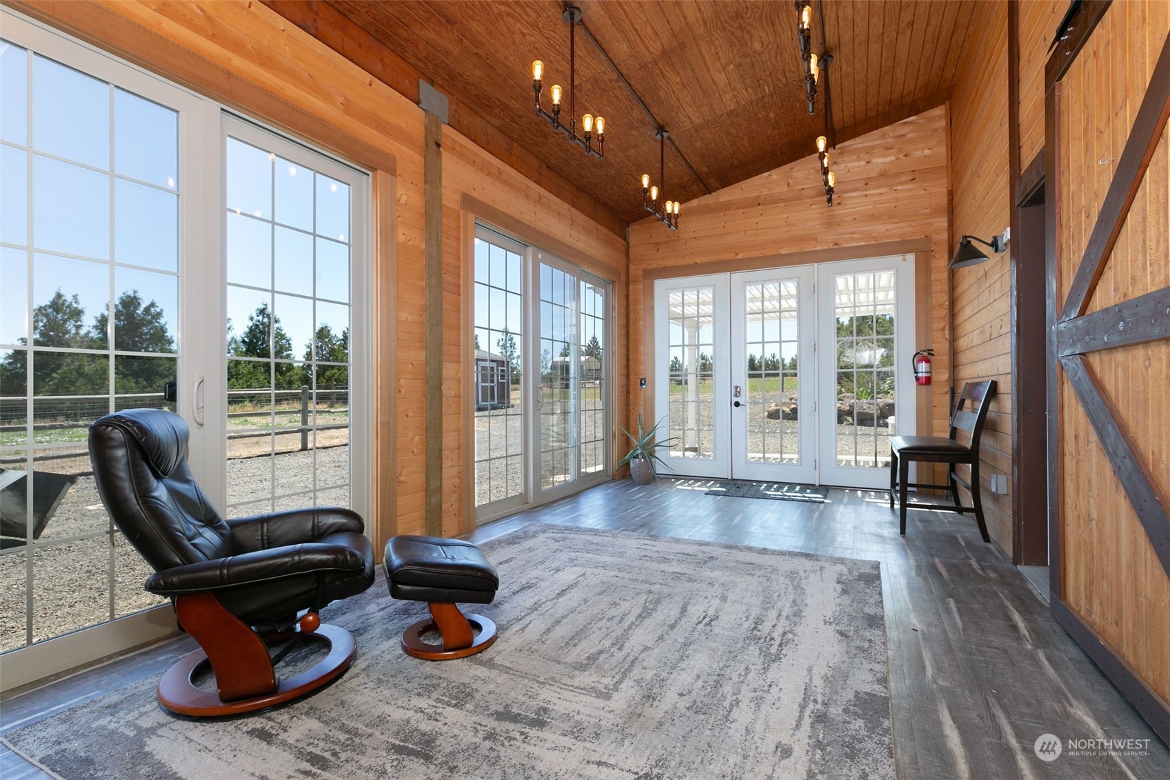 12302 Marble Road Yakima, WA 98908 - Photo 32 of 40 a room with lots of furniture and a large window