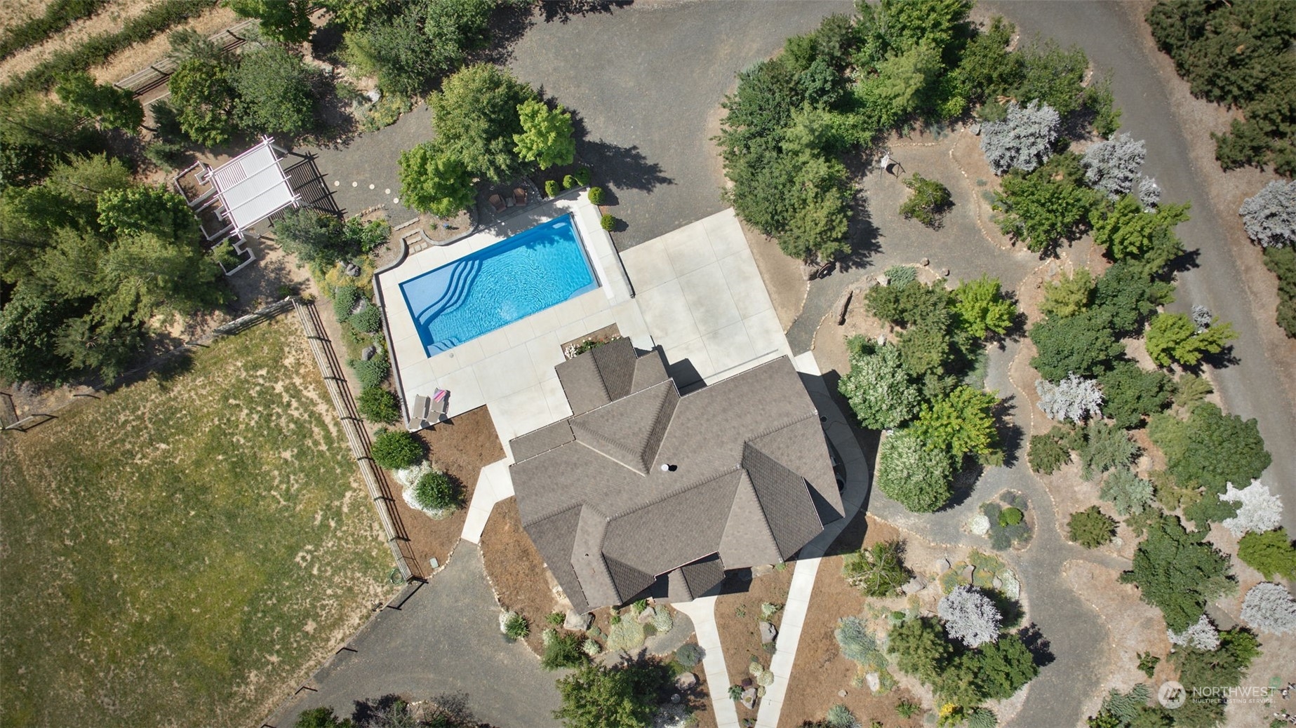 12302 Marble Road Yakima, WA 98908 - Photo 5 of 40 an aerial view of a house with outdoor space and a lake view