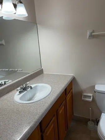 a bathroom with a toilet and a bathtub