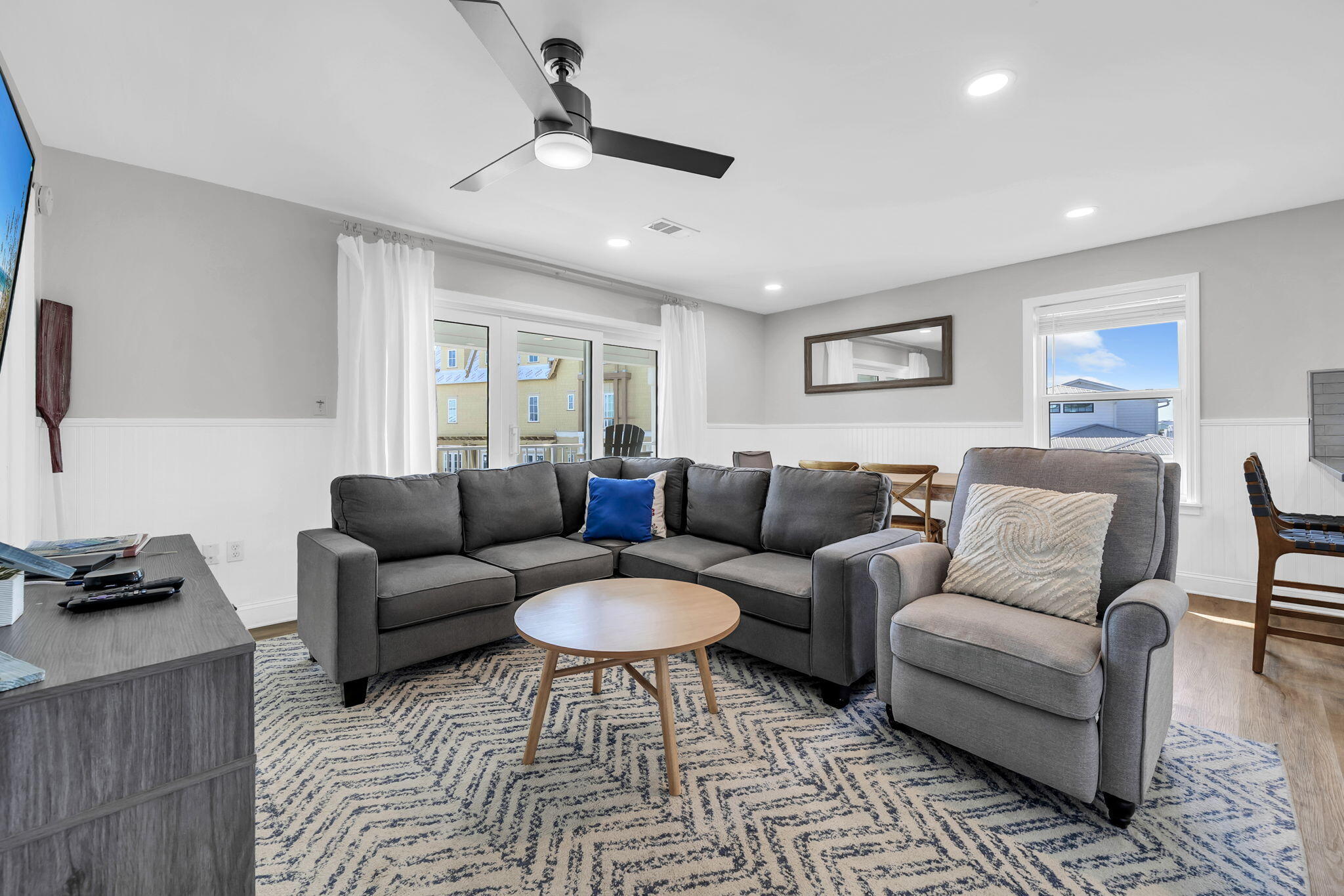11 Beachside Drive, Unit 131 Santa Rosa Beach, FL 32459 - Photo 1 of 25 a living room with furniture and a flat screen tv