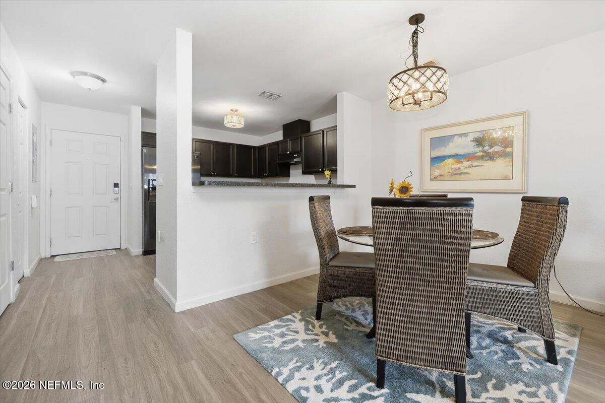 156 Sandy Beach Lane Atlantic Beach, FL 32233 - Photo 6 of 15 06-Dining Room to Kitchen