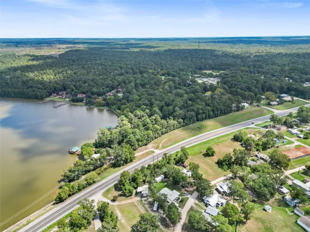 a view of a lake with a yard