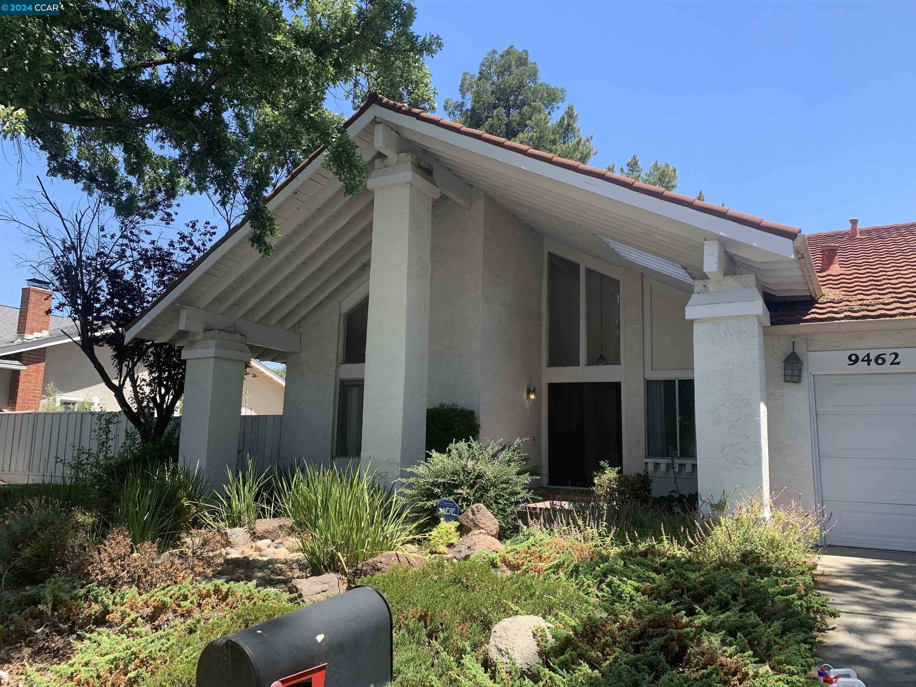 9462 Thunderbird Place San Ramon, CA 94583 - Photo 4 of 17 front view of a house with a yard